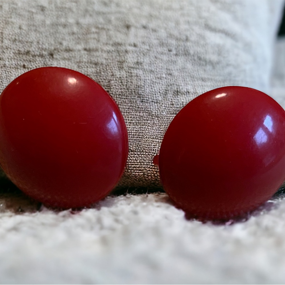 Vintage Richelieu cherry red Bakelite screw back earrings.
